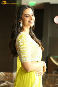 actress Meenakshi Chaudhary beautiful in a yellow saree