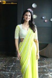 actress Meenakshi Chaudhary beautiful in a yellow saree