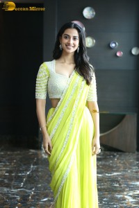 actress Meenakshi Chaudhary beautiful in a yellow saree