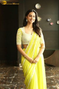 actress Meenakshi Chaudhary beautiful in a yellow saree