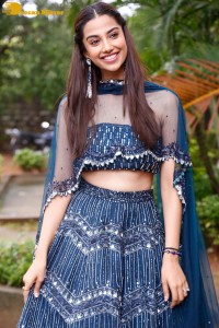 Telugu Actress Meenakshi Chaudhary in a blue dress