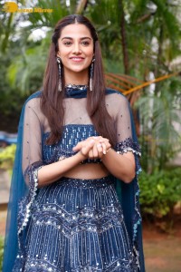 Telugu Actress Meenakshi Chaudhary in a blue dress