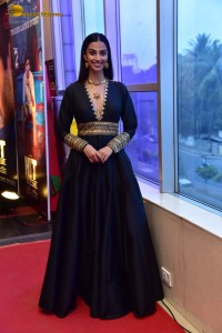 Meenakshi Chaudhary cute looks in a black dress at a movie function