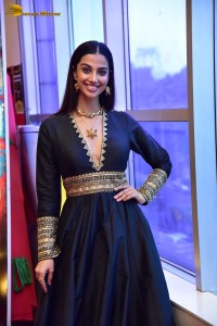 Meenakshi Chaudhary cute looks in a black dress at a movie function
