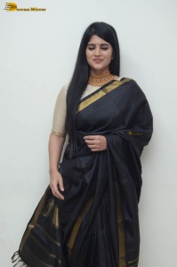 telugu actress megha akash in a black saree