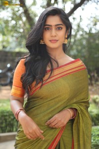 actress meghalekha lovely photoshoot in a green saree