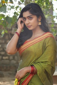 actress meghalekha lovely photoshoot in a green saree