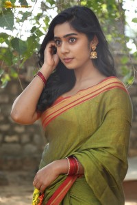 actress meghalekha lovely photoshoot in a green saree