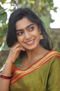 actress meghalekha lovely photoshoot in a green saree