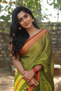 actress meghalekha lovely photoshoot in a green saree