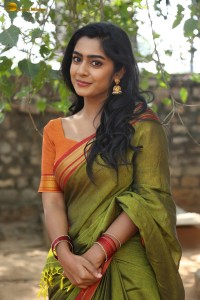 actress meghalekha lovely photoshoot in a green saree