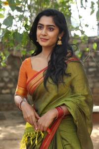 actress meghalekha lovely photoshoot in a green saree