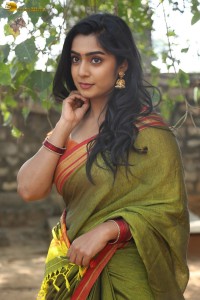 actress meghalekha lovely photoshoot in a green saree
