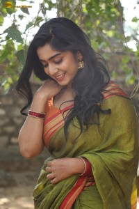 actress meghalekha lovely photoshoot in a green saree