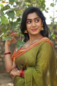actress meghalekha lovely photoshoot in a green saree