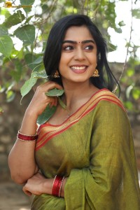 actress meghalekha lovely photoshoot in a green saree
