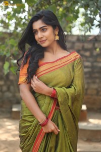 actress meghalekha lovely photoshoot in a green saree