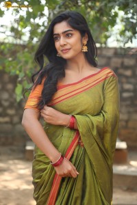 actress meghalekha lovely photoshoot in a green saree