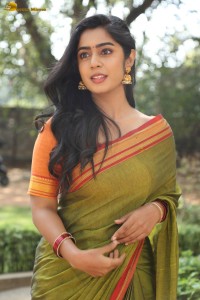 actress meghalekha lovely photoshoot in a green saree