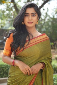 actress meghalekha lovely photoshoot in a green saree