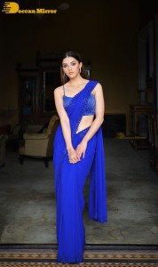 Actress Mehreen in a blue saree