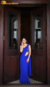 Actress Mehreen in a blue saree