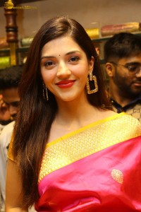 actress mehreen in a pink silk saree while inaugurating a shopping mall