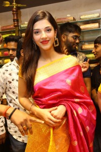actress mehreen in a pink silk saree while inaugurating a shopping mall