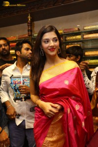 actress mehreen in a pink silk saree while inaugurating a shopping mall