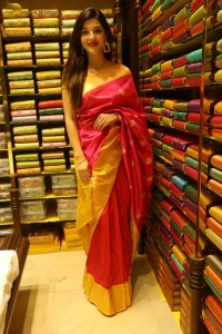 actress mehreen in a pink silk saree while inaugurating a shopping mall