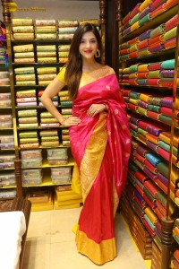 actress mehreen in a pink silk saree while inaugurating a shopping mall