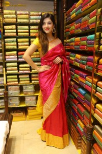 actress mehreen in a pink silk saree while inaugurating a shopping mall