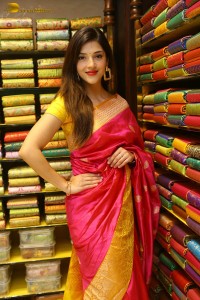 actress mehreen in a pink silk saree while inaugurating a shopping mall