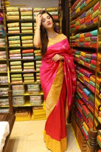 actress mehreen in a pink silk saree while inaugurating a shopping mall