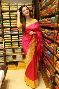 actress mehreen in a pink silk saree while inaugurating a shopping mall