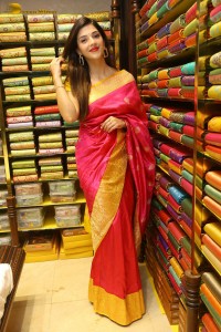 actress mehreen in a pink silk saree while inaugurating a shopping mall