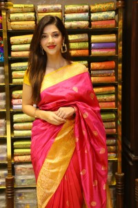 actress mehreen in a pink silk saree while inaugurating a shopping mall