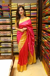 actress mehreen in a pink silk saree while inaugurating a shopping mall