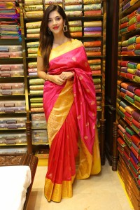 actress mehreen in a pink silk saree while inaugurating a shopping mall