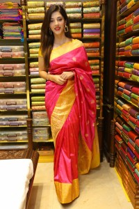 actress mehreen in a pink silk saree while inaugurating a shopping mall