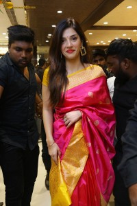 actress mehreen in a pink silk saree while inaugurating a shopping mall