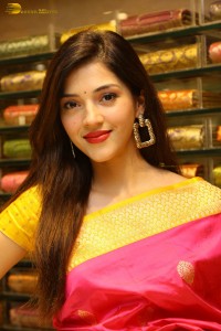 actress mehreen in a pink silk saree while inaugurating a shopping mall