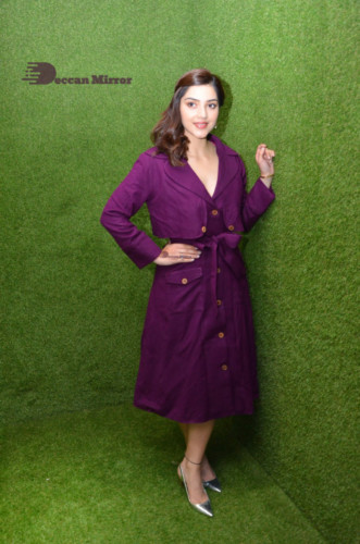 Actress Mehreen in a violet dress