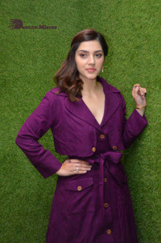 Actress Mehreen in a violet dress