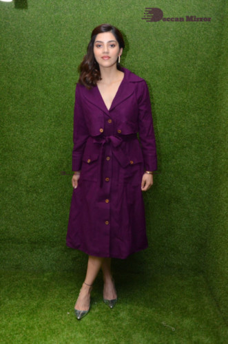 Actress Mehreen in a violet dress