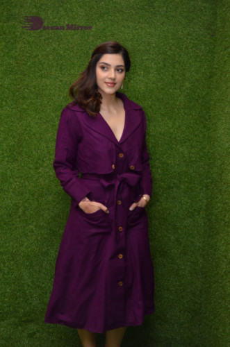 Actress Mehreen in a violet dress