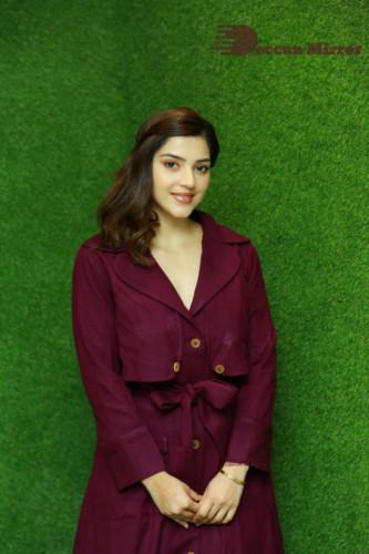 Actress Mehreen in a violet dress