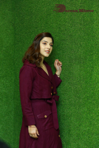 Actress Mehreen in a violet dress