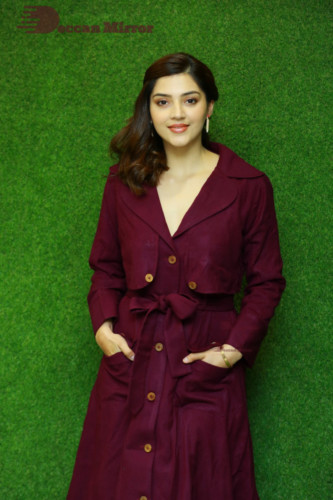 Actress Mehreen in a violet dress
