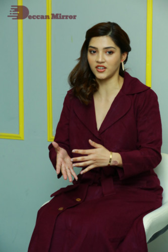 Actress Mehreen in a violet dress